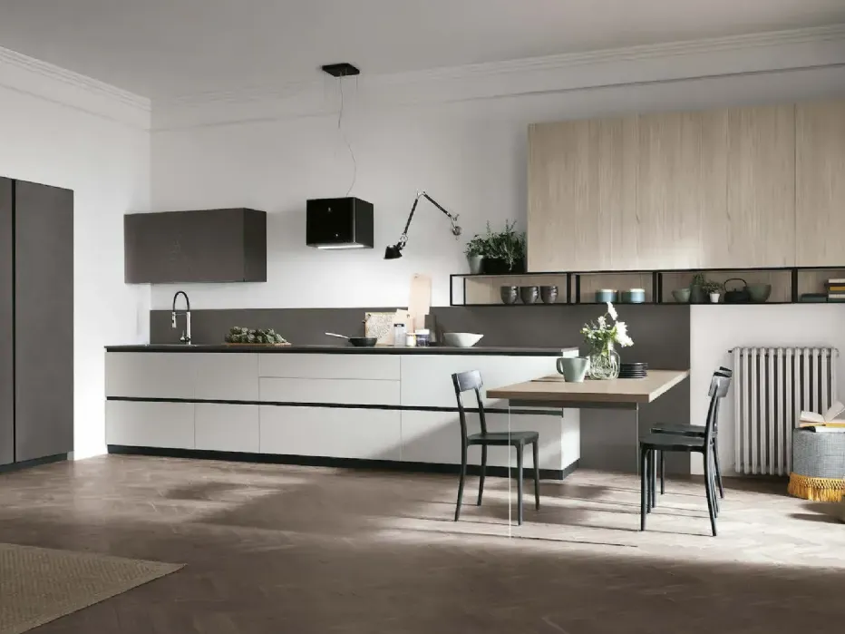 Matt Nebbia Pet base units, Dark Cement wall units and columns. Size wall units and open compartments in Sand Larch. Dark Cement laminate countertop.