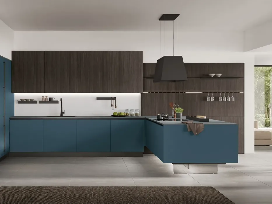 Moka Oak, matt Oltremare, and Sapienstone Blue Steel countertops bring characterful flavours to the kitchen, balanced by the modernity of Basalt and the materiality of Pietra Ghiaia.