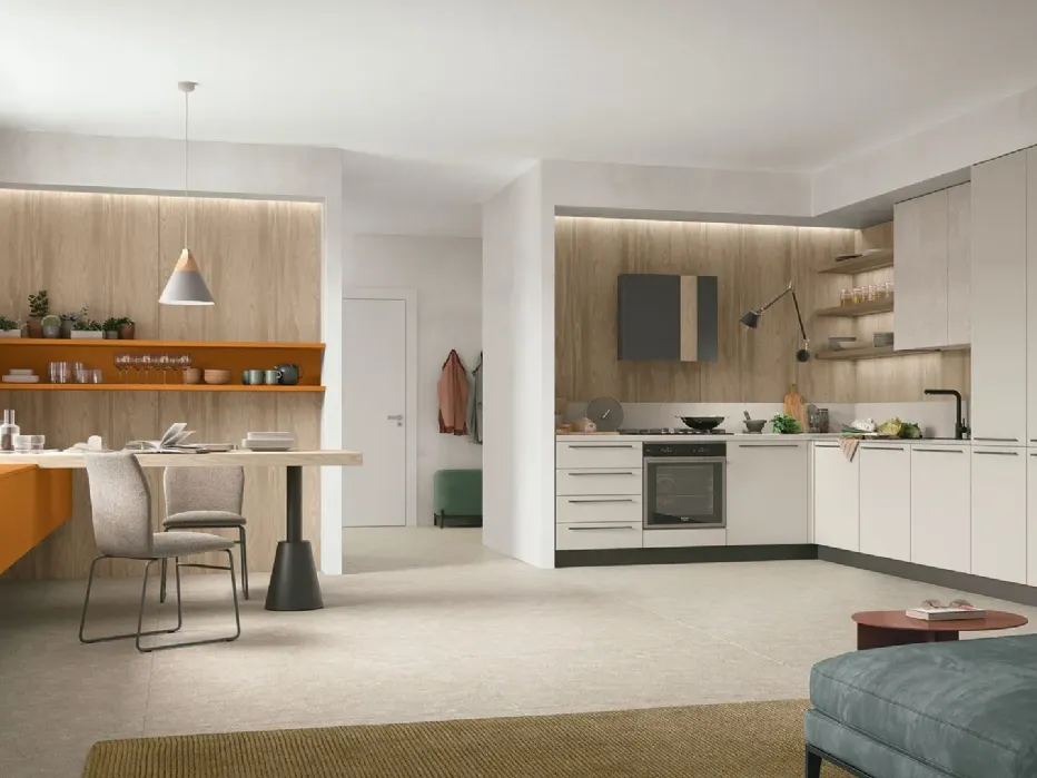 A mix of dark tones and wood, which highlight the different areas of the kitchen.