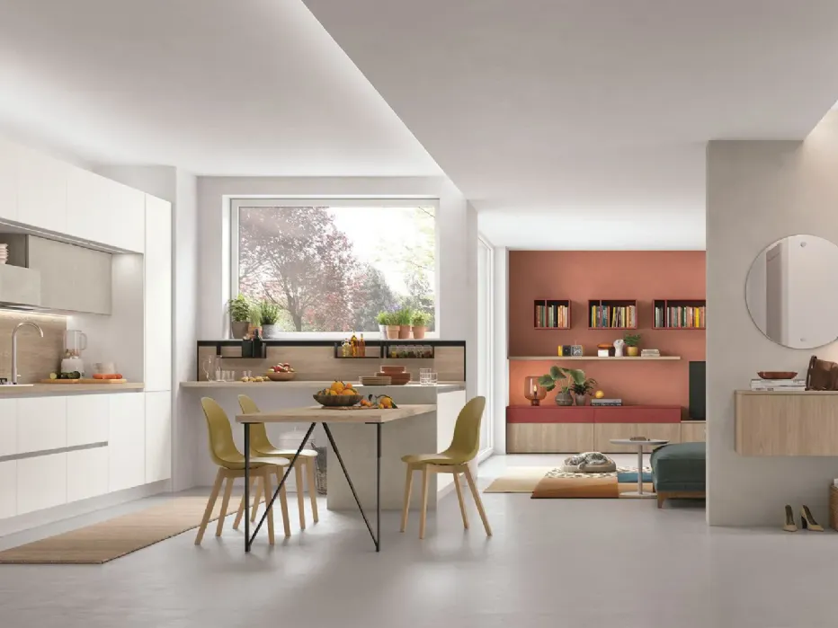 Noce Marino, Pietra Ghiaia, Pietra Corallo, Artico give shape to a trendy, one-of-a-kind kitchen.